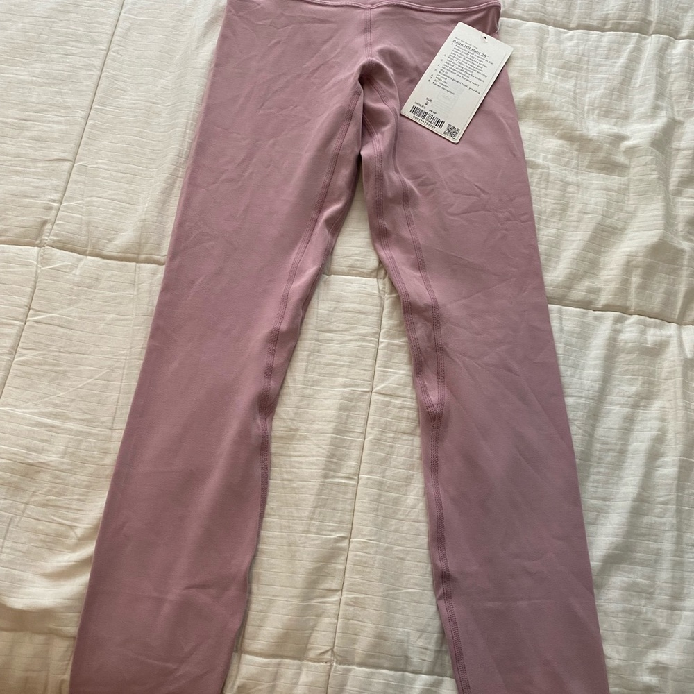 Lululemon pink Align HR pant 25”. New with tag.